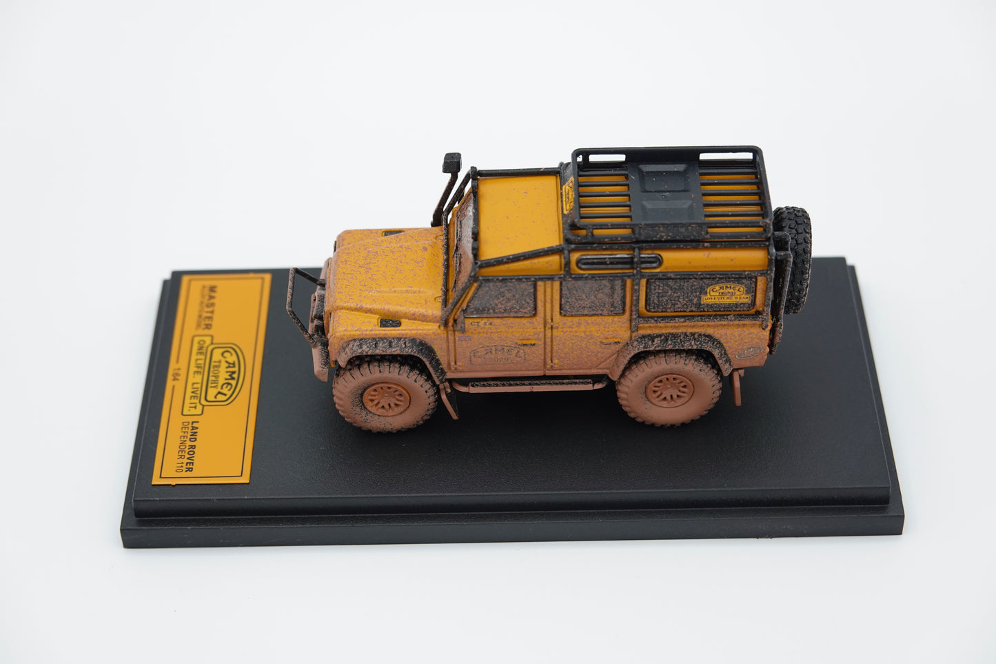 Decode | LandRover Defender110 Camel Trophy Rally Dirty Version | 1:64